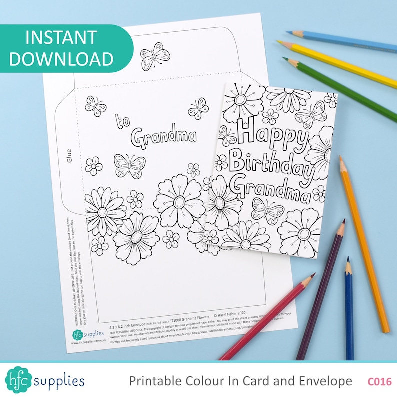 May include: Printable black and white card and envelope set with floral and butterfly designs. The card reads "Happy Birthday Grandma." The envelope says "to Grandma." Colored pencils are scattered around the card.