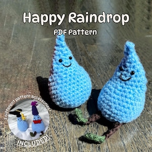 May include: Two blue crochet raindrop figures with smiling faces and brown and green legs. The image includes the text "Happy Raindrop PDF Pattern" and a smaller image of two additional raindrop figures with accessories.
