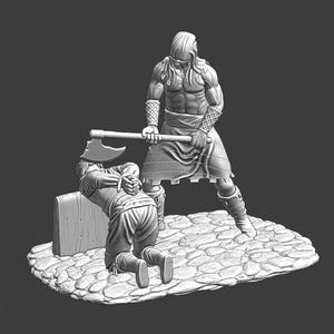 May include: A grayscale 3D-printed figurine depicting a historical execution scene. A muscular figure, wielding a large axe, stands over a kneeling person with bound hands. The figures are on a cobblestone base, with a wooden block.