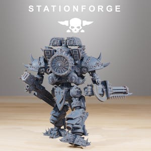 May include: A gray, detailed model of a war machine with the text "STATIONFORGE" above it. The model has a skull and wings logo, a large central turbine, and various weapon attachments. It is a detailed miniature.