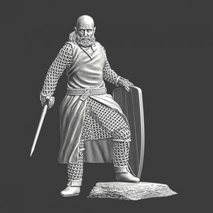 May include: A detailed grayscale figurine of a medieval knight. The knight is bald with a long beard, wearing chainmail armor, a tunic, and boots. He holds a sword and leans on a shield, standing on a stone base. The figure is highly detailed.