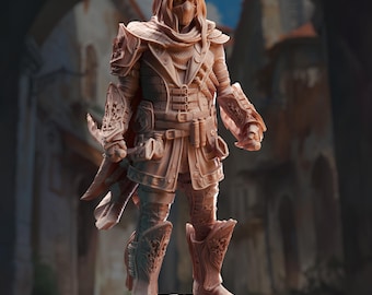 May include: A detailed miniature figurine of a warrior wearing a hooded cloak, chainmail armor, and leather boots. The figurine is painted in a brown and tan color scheme and is posed in a standing position.