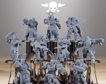 May include: A collection of gray miniature figurines of armored figures, some holding weapons. The figures are arranged on tiered platforms. The text "STATIONFORGE" and a skull logo are at the top.
