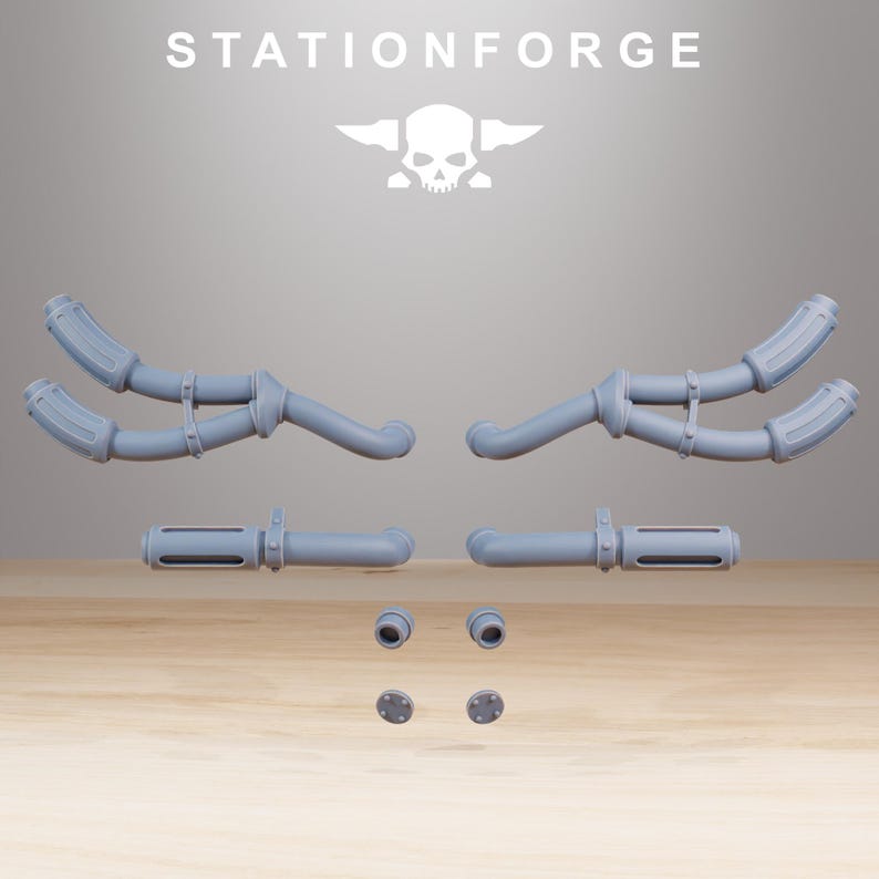 May include: A collection of light gray, 3D-printed mechanical components, including curved pipes, cylindrical pieces, and small circular parts. The word "STATIONFORGE" is printed at the top, along with a skull and crossbones logo. The parts are arranged on a wooden surface.