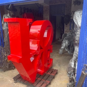 Large Red LOVE Sculpture: Modern Metal Art Decor
