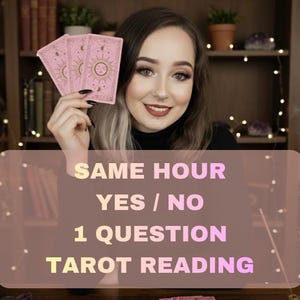 May include: A woman holding pink tarot cards with sun and moon designs. The image includes text that reads "SAME HOUR YES / NO 1 QUESTION TAROT READING". Lit candles and a crystal ball are also visible.