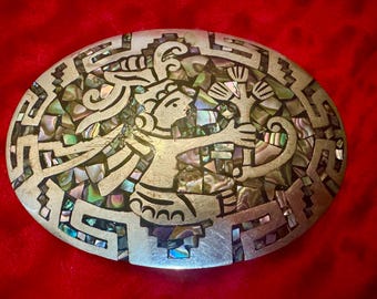 Impresionante hebilla de cinturón de guerrero maya azteca de plata esterlina de los años 70 con incrustaciones de abulón. Joyería artesanal mexicana hecha a mano.