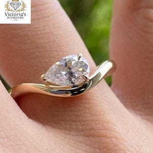 2 Ct Pear Cut Moissanite Engagement Ring: 14K Gold East West Solitaire