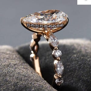 2.50 Ct Pear Moissanite Engagement Ring: Hidden Halo, Marquise Accent