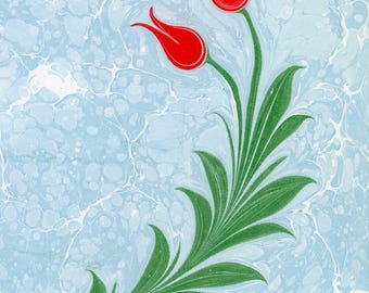 May include: A vibrant artwork featuring two red tulips with green stems and leaves against a light blue, marbled background. The floral design is a stylized representation of nature, with a focus on color and form.