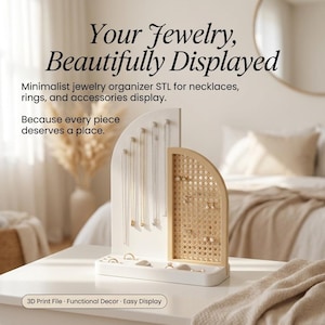 May include: A white minimalist jewelry organizer with an arched design, featuring space for necklaces, rings, and accessories. The text reads "Your Jewelry, Beautifully Displayed" and "Because every piece deserves a place."