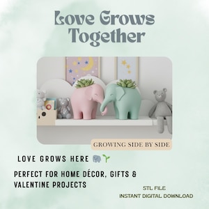 May include: A pastel-themed image features two elephant-shaped planters, one pink and one mint green, each holding a small succulent. The text "Love Grows Together" is at the top, with "Growing Side by Side" below. The phrase "Love Grows Here" is also present.