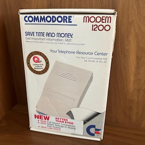 Vintage Modem 1200 for the Commodore 64, 128, SX-64, and VIC-20 Computers in Box. Vintage Tech, Retro Computing, Computer Modem, Telephone