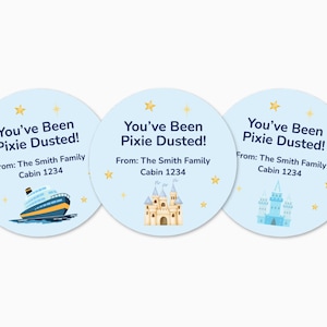 May include: Three light blue circular stickers with the text "You've Been Pixie Dusted!" and "From: The Smith Family Cabin 1234". Each sticker features a different illustration: a cruise ship, a castle, and a fairytale castle.