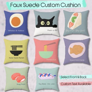 May include: Nine faux suede custom cushions with various designs. The designs include a fried egg, a black cat, a sandwich, ramen, a fish-shaped pastry, sushi, and text that reads "Whites & Yellow", "Peek-a-Boo", "Stay Fresh Stay Sweet", "Home Sweet Ramen", "Ramen Fuel", "Happiness Inside", "Stay Fresh", and "Soy Mate - Est. 2025".