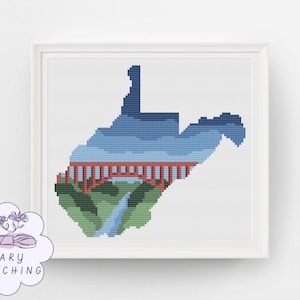 May include: A framed cross-stitch pattern depicting the state of West Virginia in a pixelated style. The design features a red arch bridge spanning a river, with green hills and a blue sky filling the state outline. A logo reads MARY STITCHING.