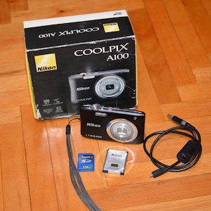 Nikon Coolpix A100 20.1MP Digital Camera Boxed 10X Zoom
