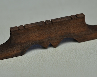 Wooden bridge of Balalaika 6 strings folklore instrument