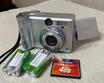 Canon Powershot A95 digitale camera 5.0MP klapscherm zilver 4 GB kaart werkt
