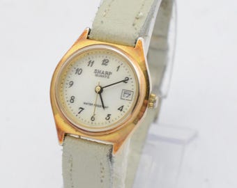 Vintage Sharp Ladies Quartz Watch Tone white Strap Working 344619-p
