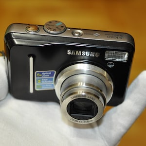 Samsung S1060 10.2 MP Compact Digital Camera black TESTED
