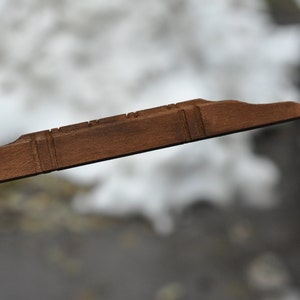Holzsteg der Mandoline Mandolina domra Folklore Instrument