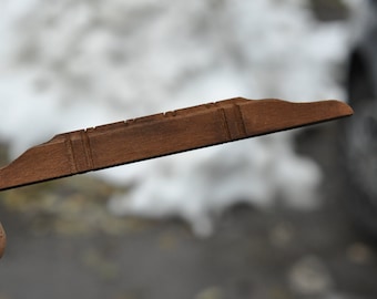 Wooden bridge of Mandolin Mandolina domra folklore instrument