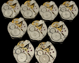 a lot of 10 matching eye-shaped women's watch movements steampunk supplies