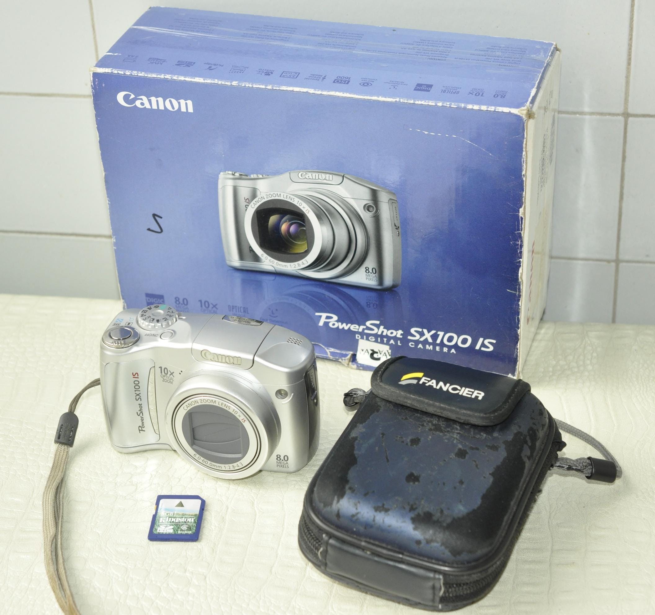 Canon Powershot SX100 IS 8.0MP Digital Camera - SILVER Canon Powershot SX100 IS 8.0MP Digital Camera - SILVER