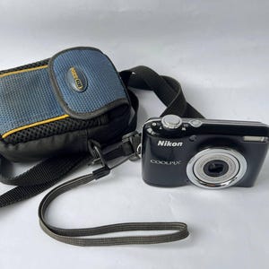 Nikon Coolpix L23 camera black 10.1 MP Tested Working