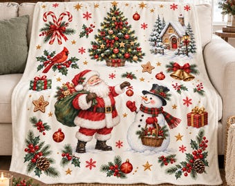 May include: A cream-colored throw blanket featuring a festive Christmas print with Santa Claus, a snowman, a decorated pine tree, a snowy cottage, candy canes, red cardinals, gift boxes, golden bells, pinecones, and red holly berries.