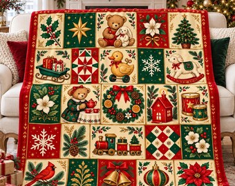May include: A Christmas-themed throw blanket featuring a patchwork grid of festive illustrations including teddy bears, a rocking lamb, a toy train, a cardinal, poinsettias, holly, snowflakes, a wreath, and a red house on a cream background.