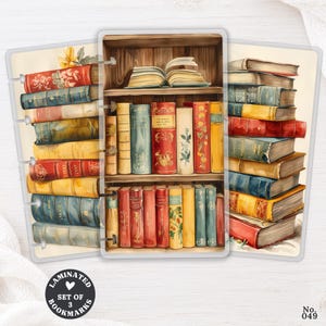 May include: A set of three laminated bookmarks featuring illustrations of stacked books on wooden shelves. The designs include various colorful book spines in shades of red, blue, yellow, and green, with floral patterns and an open book on a shelf.