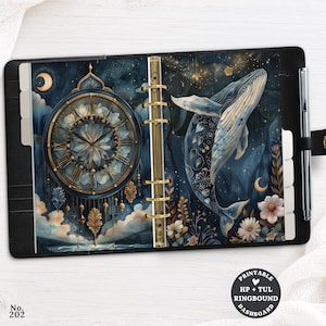 May include: A black ring-bound planner featuring a dashboard with a dark blue celestial theme. The left side displays a large ornate clock with Roman numerals, while the right side shows a whale swimming among stars, flowers, and crescent moons.