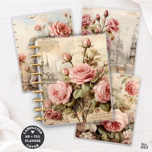 May include: A set of laminated planner covers featuring vintage-style illustrations of pink roses, green leaves, and architectural sketches on a cream background. The covers have gold-coloured disc-bound spine rings and a circular black logo.