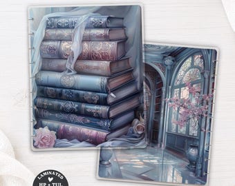 May include: Two rectangular laminated ringbound dashboards. One features a stack of blue and purple books with ornate gold detailing and a pink rose. The other shows an interior scene with arched windows, blue architectural columns, and a pink flowering tree.