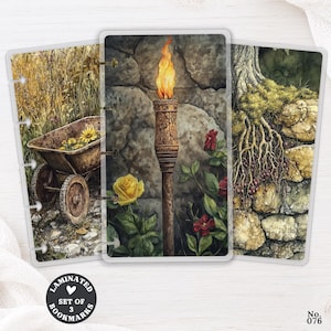 May include: A set of three rectangular laminated bookmarks featuring detailed illustrations. One shows a wheelbarrow with sunflowers, another a lit torch with roses against a stone wall, and the third depicts tree roots over stones.