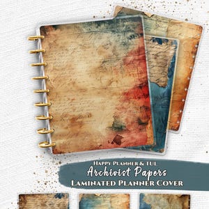 May include: A set of laminated planner covers featuring vintage-style script and distressed textures in shades of brown, tan, and blue. The covers include gold-coloured disc-bound rings and text that reads Everpage, Happy Planner & TUL Archivist Papers.