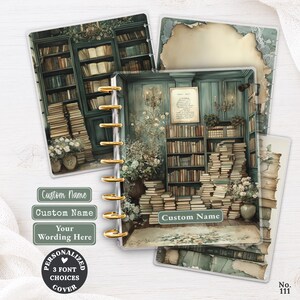 May include: A disc-bound notebook featuring a cover illustration of a library with teal walls, floor-to-ceiling bookshelves, and stacks of books. The cover includes a rectangular label with the text Custom Name and gold discs.