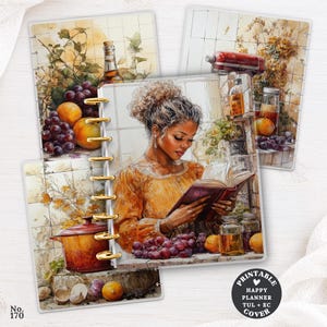 May include: A set of three disc-bound planner covers featuring watercolor illustrations of a person reading a book in a kitchen with grapes, oranges, a red pot, and a stand mixer. The covers have gold-colored discs and a circular label reading PRINTABLE HAPPY PLANNER TUL + EC COVER.