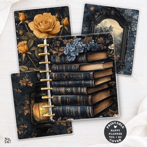 May include: Three disc-bound planner covers featuring dark, moody designs. One cover displays a stack of vintage books with blue flowers, another shows a large yellow rose on a dark background, and the third depicts a glowing lantern and a gothic mirror.