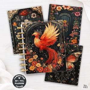 May include: A set of three laminated planner covers featuring dark backgrounds with vibrant floral patterns, a central phoenix illustration, and a butterfly wing design. The covers include gold-colored disc-bound spine holes and a circular label reading Laminated HP + TUL Planner Cover.