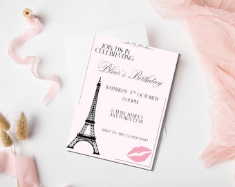 May include: A pink and white invitation with black text that reads "Join us in celebrating Blair's Birthday". The invitation features a black silhouette of the Eiffel Tower and a pink lipstick kiss.