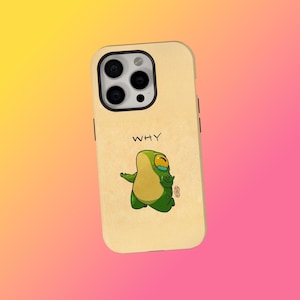 May include: A beige phone case with a cartoon illustration of a green creature with the word "WHY" above it. The creature has a yellow face and is gesturing with its arms. The phone case has a camera cutout.