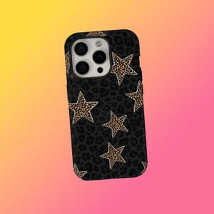 May include: Black phone case with a leopard print background and several leopard print stars. The case has a glossy finish and is designed to fit a smartphone. The case has a camera cutout and button covers.