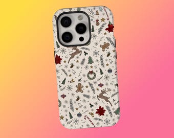 May include: A white iPhone case with a festive Christmas pattern. The design includes reindeer, gingerbread men, Christmas trees, snowflakes, and candy canes in red, green, and brown. The case has a black camera module.