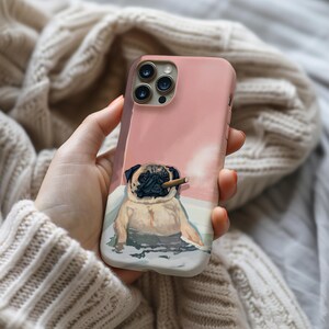 May include: Pink phone case featuring a pug dog with a cigar. The pug is depicted in a pool of water. The case has a smooth finish and a raised edge to protect the phone's screen and camera.