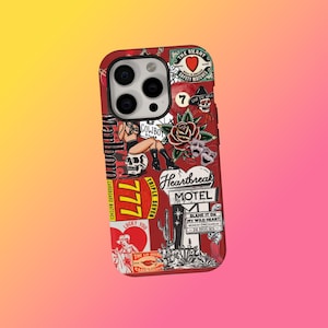 May include: A red phone case adorned with a collage of retro graphics, including a skull, a rose, and the words "Heartbreak Motel." The case features the text "Marlboro" and "777" in a bold font.