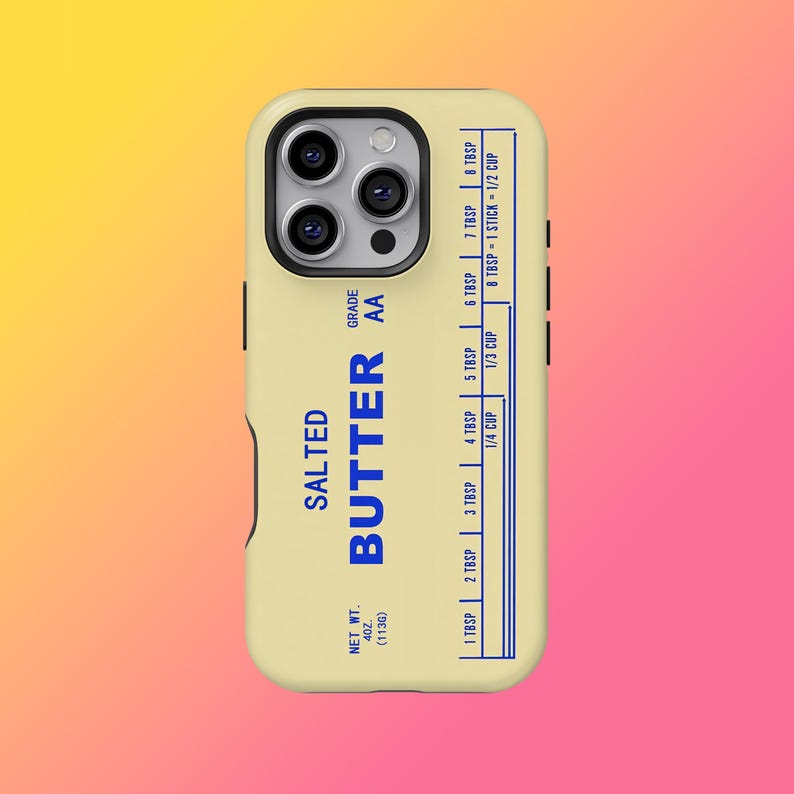 May include: A phone case with a butter-themed design. The case is light yellow with blue text that reads "SALTED BUTTER" and a measurement guide. The case has a camera cutout and black side buttons.