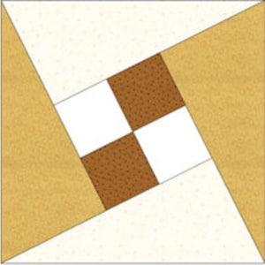 May include: A quilt block with a brown and white checkerboard pattern in the center, surrounded by four white squares and four tan squares.